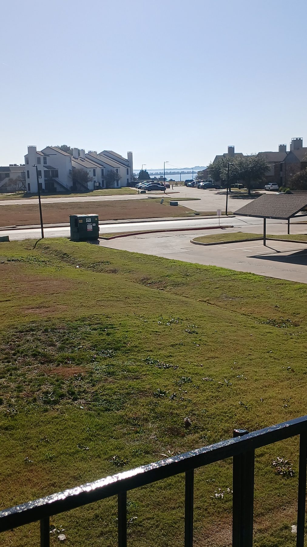 Landscaped Vista Isle community grounds viewed from a private balcony