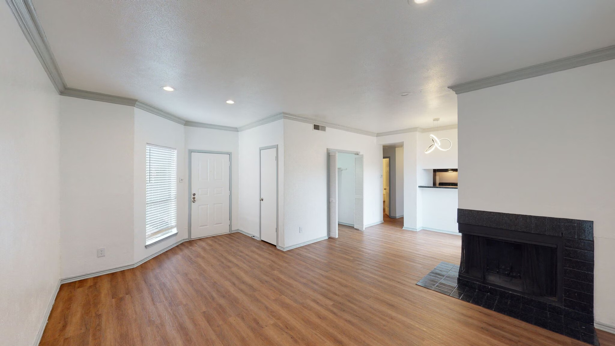 Sunlit room with fresh paint and wide doorways